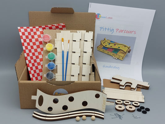 Knutselen voor kinderen met knutselpakket Schuivende Schijven – inhoud met houten onderdelen, spijkertjes en een duidelijke handleiding