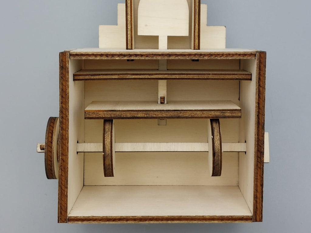 Detail van het draaimechaniek van knutselpakket Slimme Sint automaton